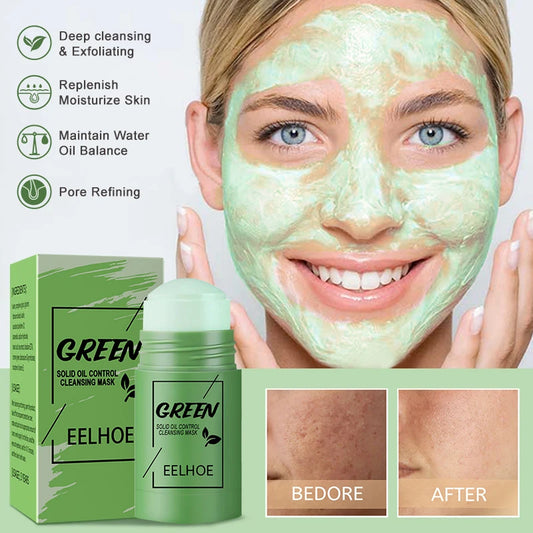 Female person with green cleansing mask on her face